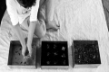 Fiorella Bologna, Sacrum, 2011, Installazione,lino, acqua, terra, semi, metallo, ricami, perline, cm. 200x180