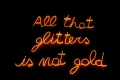 Fabrizio Dusi, All that glitters is not gold, 2023 Neon giallo con scritta luminosa in corsivo montata su un telaio in materiale metallico, cm 110x150 Courtesy of the Artist